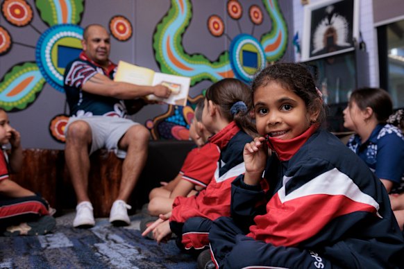 Jason Sampson teaches Brooke (right) and her year 2 classmates at Briar Road Public School.