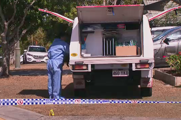 An officer at the scene of the stabbing in Hemmant on Sunday.
