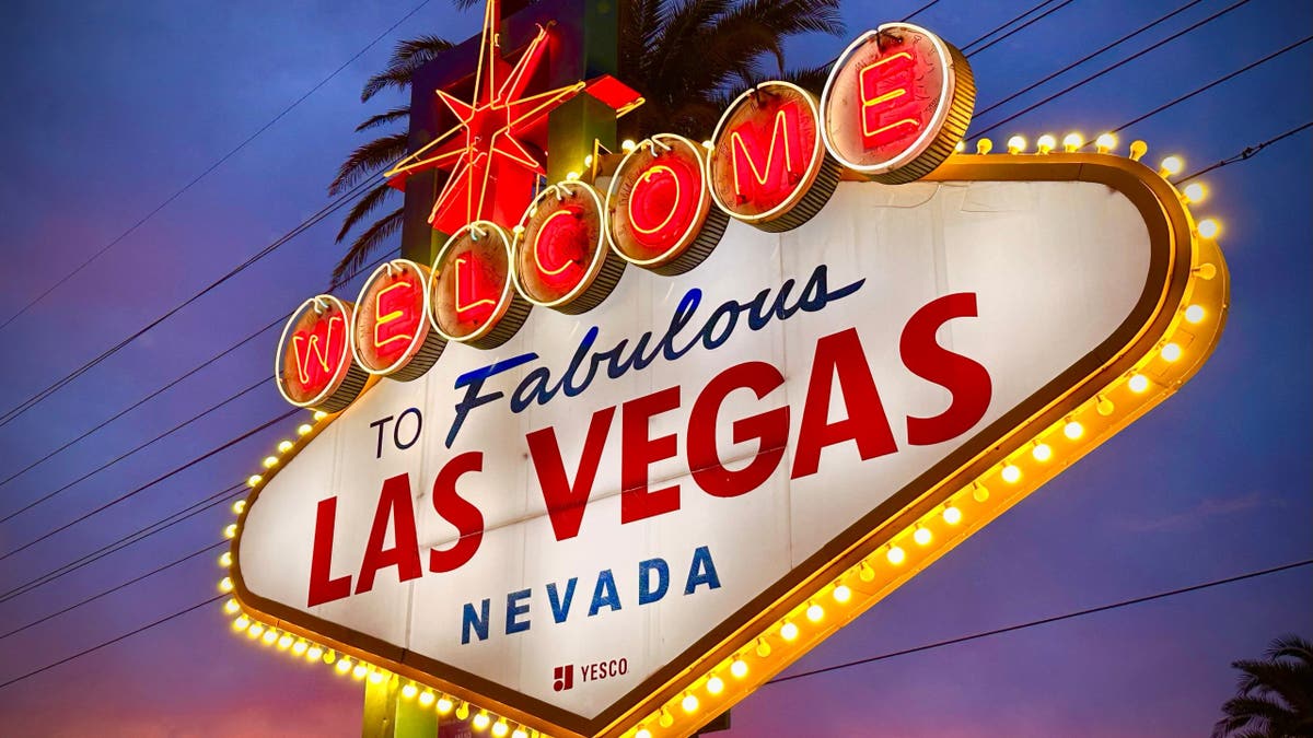 Welcome to Las Vegas sign stands near the road in Las Vegas.