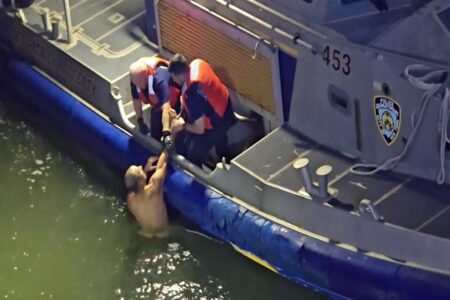 Dramatic video shows naked man being pulled from East River by NYPD