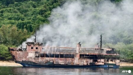 Philippine Coast Guard battles smoke in search for ferry fire missing