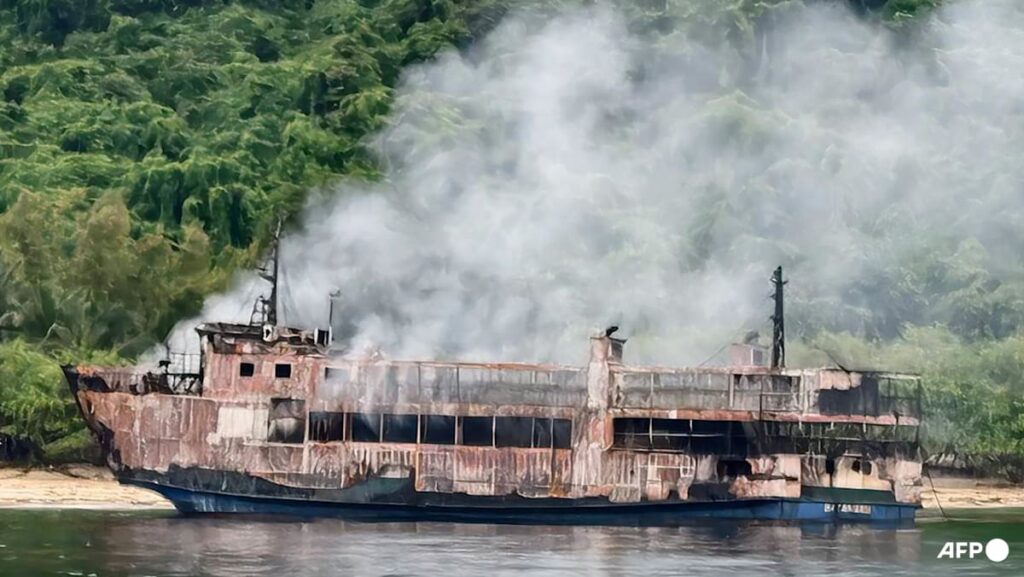 Philippine Coast Guard battles smoke in search for ferry fire missing