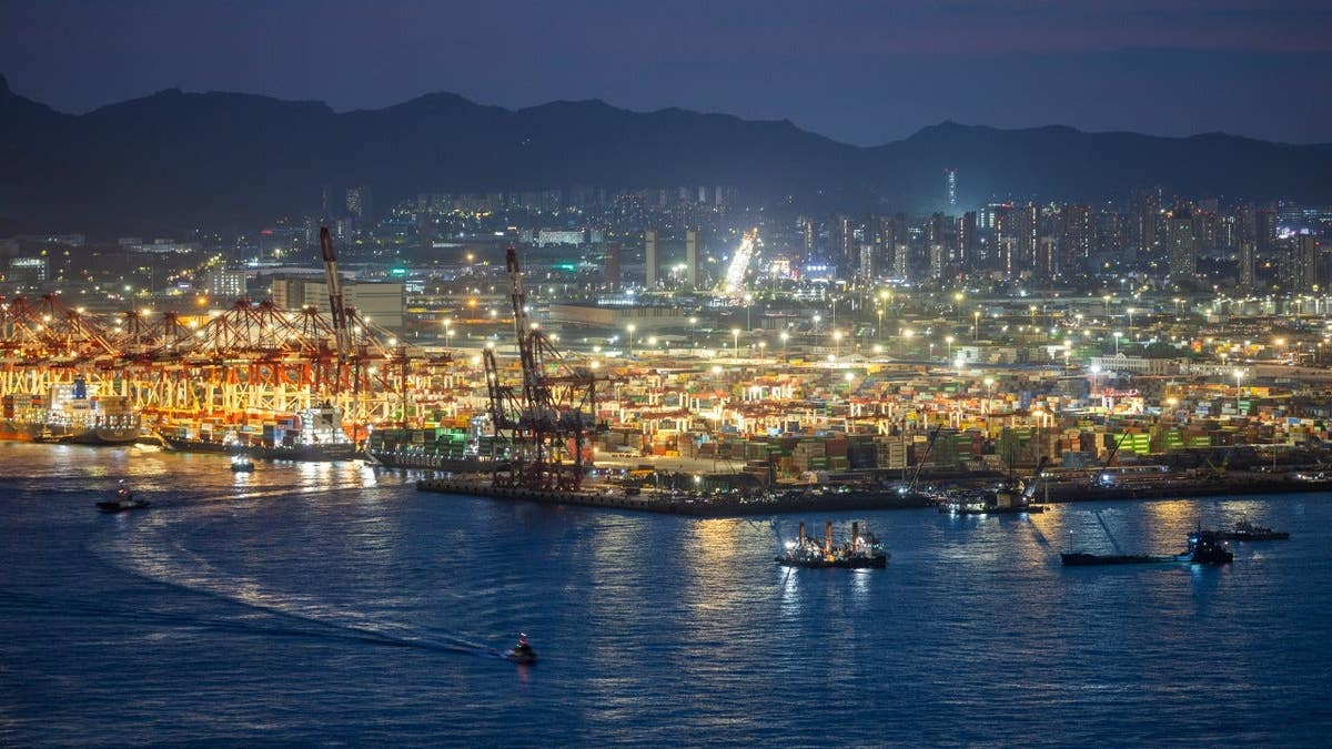 Aerial view of illuminated Qingdao Qianwan Container Terminal