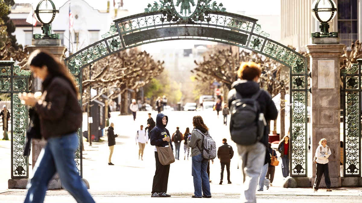 students walk on campus